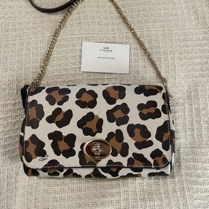 Coach.  Leopard print purse and wristlet .